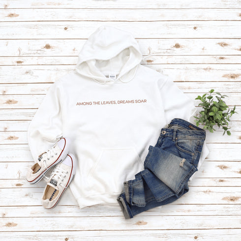 Wrap yourself in the charm of nature with our Among the Leaves Hoodie, a wearable piece of folk art that celebrates the harmony of birds, branches, and blooms.